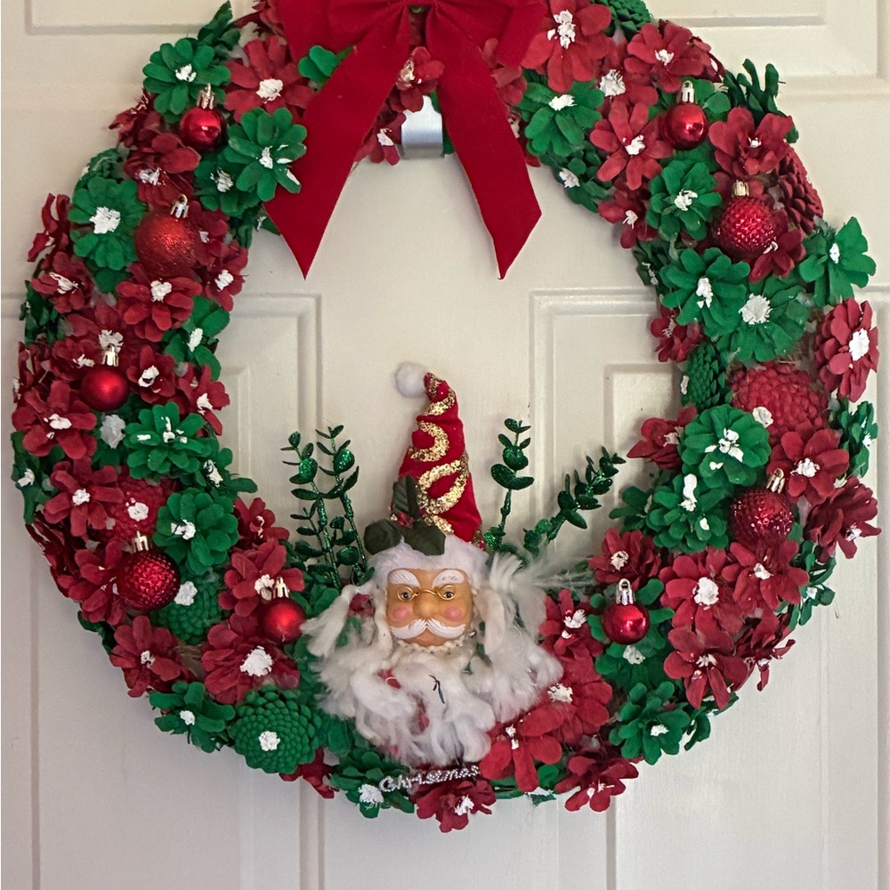Santa's Holiday Wreath with Red and Green Accents With Pinecones.